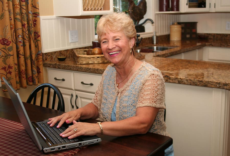Senior woman on computer
